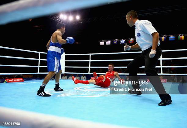 Ashley Williams competes against Devendro Liashram of India during the Men's Light Fly 46-49kg Semi-Finals Boxing at Scottish Exhibition And...