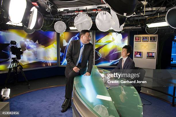 Phoenix TV CEO Liu Changle, left, and anchorman Wang Ruo Lin at the Phoenix TV Hunghom studio in Hong Kong.