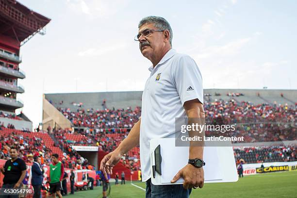 Coach Ricardo Ferretti of Tigres walks to the bench prior a match between Tijuana and Tigres UANL as part of 3rd round Apertura 2014 Liga MX at...