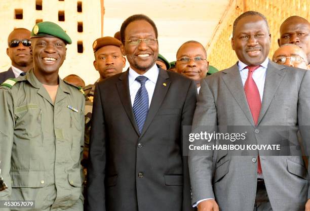 President of the National Assembly of Mali Dioncounda Traoré poses for a photograph with Captain Amadou Sanogo following a meeting in Kati on April...