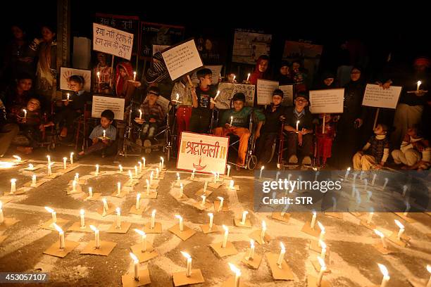 Indian children born with congenital disease, second generation victims of the1984 Bhopal gas tragedy, participate in a candle light vigil to pay...