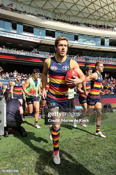 Crows players take to the field before the round 19 AFL match between the Adelaide Crows and the West Coast Eagles at Adelaide Oval on August 2, 2014...