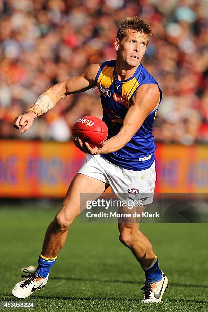 Mark LeCras of the Eagles passes the ball during the round 19 AFL match between the Adelaide Crows and the West Coast Eagles at Adelaide Oval on...