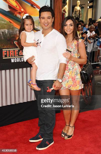 Mario Lopez, Courtney Mazza and daughter Gia Francesca Lopez attend the premiere of "Planes: Fire & Rescue" at the El Capitan Theatre on July 15,...