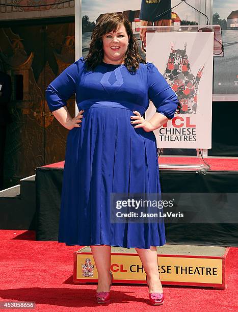 Actress Melissa McCarthy is immortalized with a hand and footprint ceremony at TCL Chinese Theatre on July 2, 2014 in Hollywood, California.