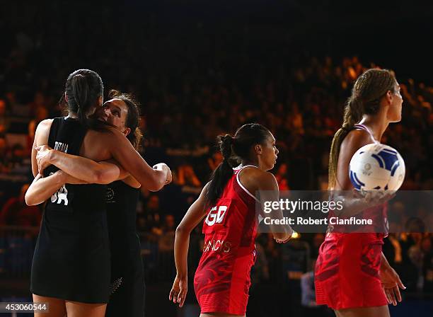 Maria Tutaia and Jodi Brown of New Zealand celebrate after New Zealand defeated England in the netball semi final between New Zealand and England at...