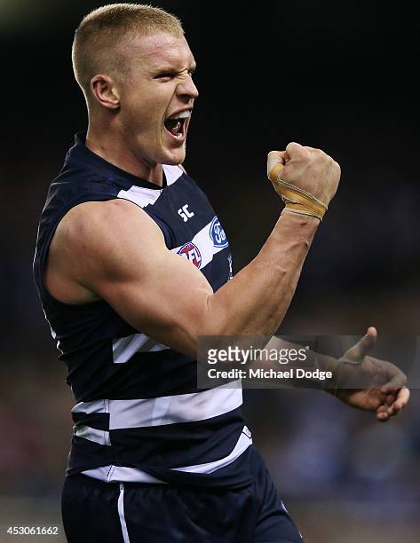 Josh Caddy of the Cats celebrates a goal during the round 19 AFL match between the North Melbourne Kangaroos and the Geelong Cats at Etihad Stadium...