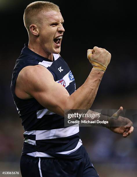 Josh Caddy of the Cats celebrates a goal during the round 9 AFL match between the North Melbourne Kangaroos and the Geelong Cats at Etihad Stadium on...