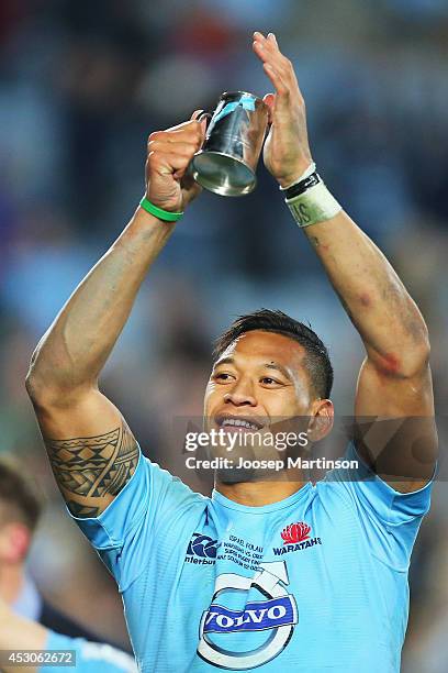 Israel Folau of the Waratahs celebrates winning the Super Rugby Grand Final match between the Waratahs and the Crusaders at ANZ Stadium on August 2,...