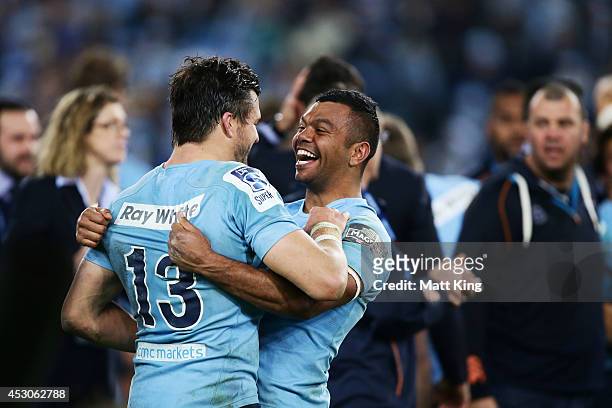 Kurtley Beale and Adam Ashley-Cooper of the Waratahs celebrate victory at the end of during the Super Rugby Grand Final match between the Waratahs...
