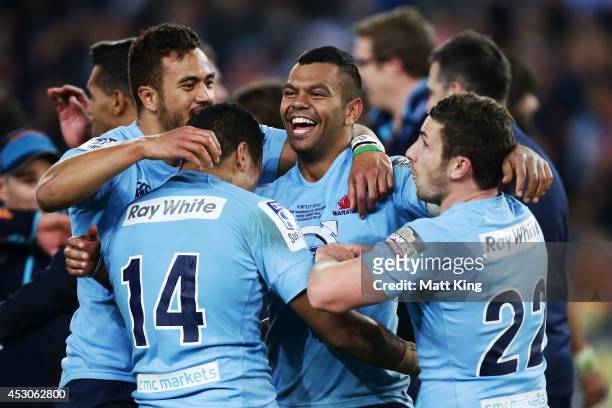 Kurtley Beale celebrates victory with team mates at the end of during the Super Rugby Grand Final match between the Waratahs and the Crusaders at ANZ...