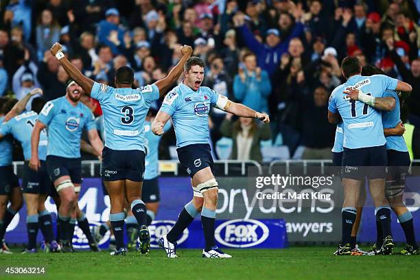 Mitch Chapman of the Waratahs celebrate victory at the end of the Super Rugby Grand Final match between the Waratahs and the Crusaders at ANZ Stadium...