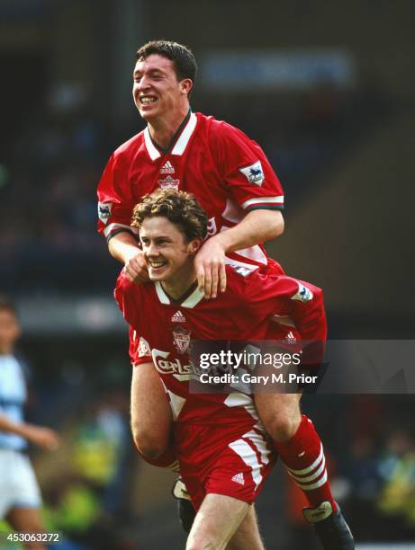 Liverpool player Steve McManaman and Robbie Fowler celebrate a goal during a Premier League match between Manchester City and Liverpool at Maine Road...