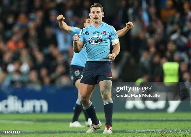 Bernard Foley of the Waratahs celebrates kicking the winning penalty during the Super Rugby Grand Final match between the Waratahs and the Crusaders...