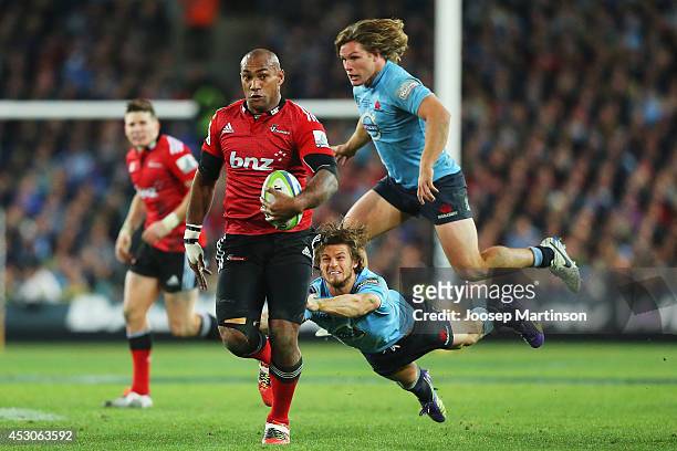 Nemani Nadolo of the Crusaders makes a break during the Super Rugby Grand Final match between the Waratahs and the Crusaders at ANZ Stadium on August...