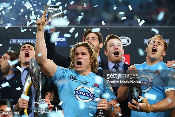 Michael Hooper of the Waratahs celebrates with team mates during the Super Rugby Grand Final match between the Waratahs and the Crusaders at ANZ...