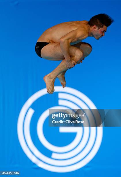 Maxim Bouchard of Canada competes in the Men's 10m Platform preliminaries at the Royal Commonwealth Pool during day ten of the Glasgow 2014...
