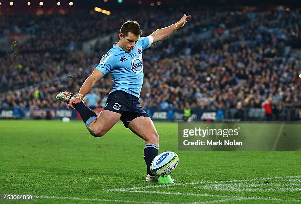 Bernard Foley of the Waratahs attempts to convert a penalty goal during the Super Rugby Grand Final match between the Waratahs and the Crusaders at...
