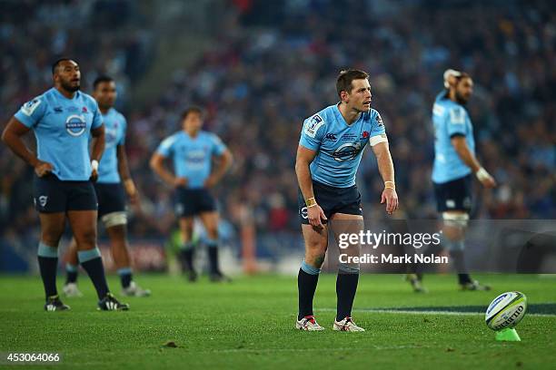 Bernard Foley of the Waratahs attempts to convert a penalty goal during the Super Rugby Grand Final match between the Waratahs and the Crusaders at...