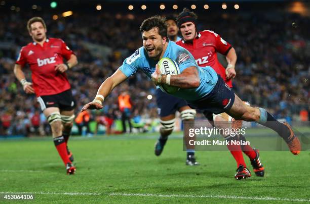 Adam Ashley-Cooper of the Waratahs dives to score a try during the Super Rugby Grand Final match between the Waratahs and the Crusaders at ANZ...