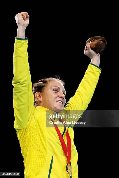 Gold medalist Shelley Watts of Australia celebrates during the medal ceremony for the Women's Light Final at SSE Hydro during day ten of the Glasgow...