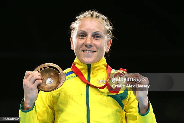 Gold medalist Shelley Watts of Australia poses during the medal ceremony for the Women's Light Final at SSE Hydro during day ten of the Glasgow 2014...