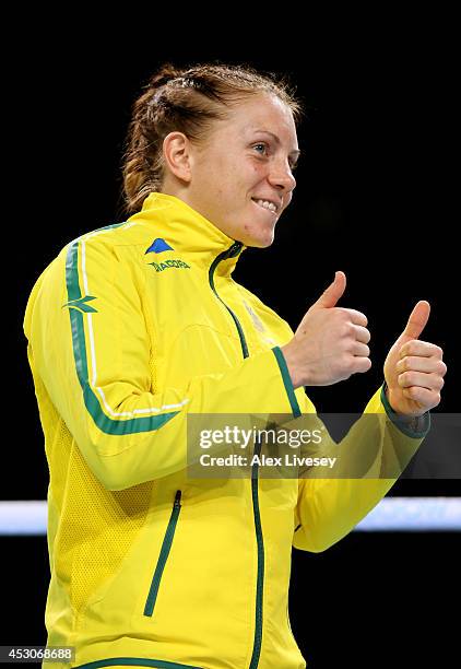 Gold medalist Shelley Watts of Australia celebrates during the medal ceremony for the Women's Light Final at SSE Hydro during day ten of the Glasgow...