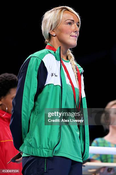 Bronze medalist Alanna Audley-Murphy of Northern Ireland looks on during the medal ceremony for the Women's Light Final at SSE Hydro during day ten...