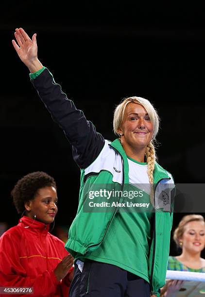 Bronze medalist Alanna Audley-Murphy of Northern Ireland celebrates during the medal ceremony for the Women's Light Final at SSE Hydro during day ten...