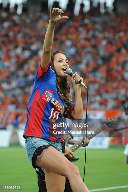 Japanese model,Anna Tsuchiya sings a song before the J. League match between F.C. Tokyo and Shimizu S-Pulse at Ajinomoto Stadium on August 2, 2014 in...