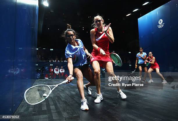 Dipika Pallikal of India and Laura Massaro of England play during the Squash Women's Doubles Final between England and India at Scotstoun Sports...