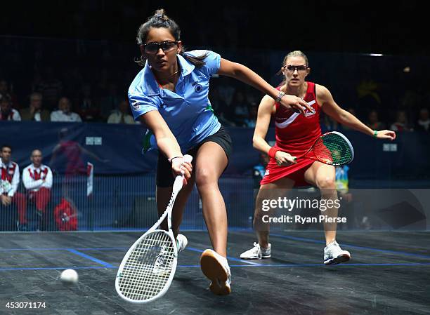 Dipika Pallikal of India plays the ball during the Squash Women's Doubles Final between England and India at Scotstoun Sports Campus during day ten...