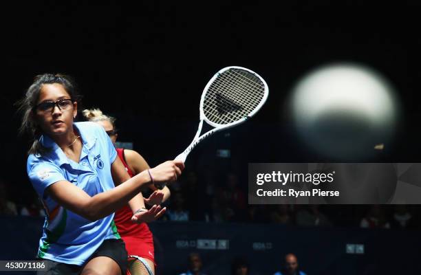 Dipika Pallikal of India plays the ball during the Squash Women's Doubles Final between England and India at Scotstoun Sports Campus during day ten...