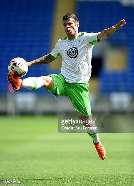Wolfburg player Vieirinha in action during the friendly match between Cardiff City and VFL Wolfsburg at Cardiff City Stadium on August 2, 2014 in...