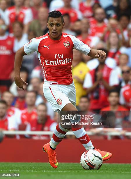 Alexis Sanchez of Arsenal in action during the Emirates Cup match between Arsenal and Benfica at the Emirates Stadium on August 2, 2014 in London,...