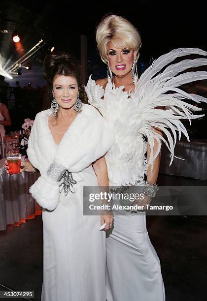 Lisa Vanderpump and Elaine Lancaster pose during the debut of LVP sangria at The White Party in Miami and help raise awareness for HIV/AIDS at Soho...