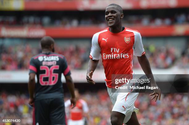 Joel Campbell of Arsenal celebrates scoring during the Emirates Cup match between Arsenal and Benfica at the Emirates Stadium on August 2, 2014 in...