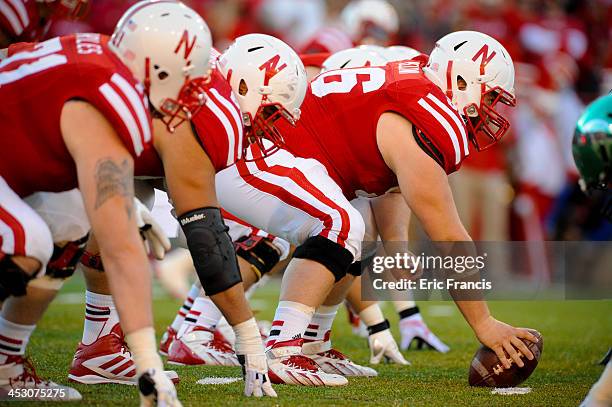 Mark Pelini of the Nebraska Cornhuskers prepares to snap the ball against the Michigan State Spartans during their game at Memorial Stadium on...