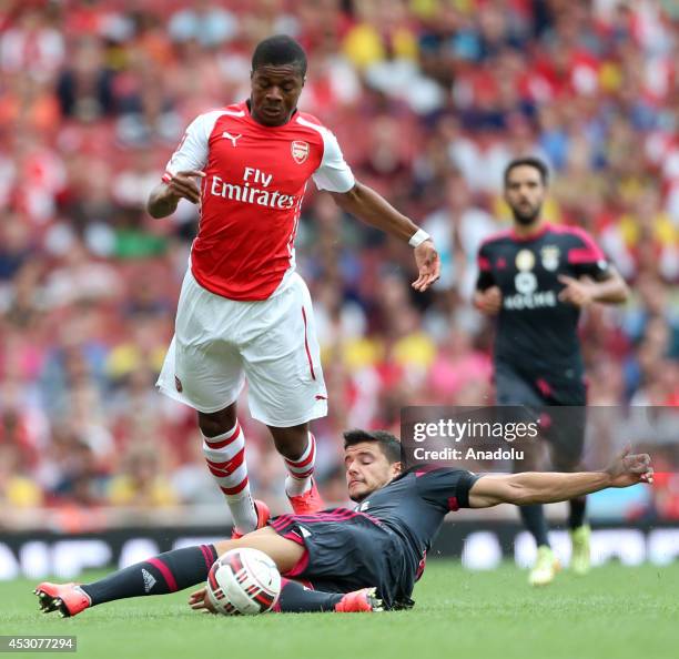 Chuba Akpom of Arsenal in action against his opponents during the Emirates Cup 2014 soccer match between Arsenal and Benfica at the Emirates Stadium...