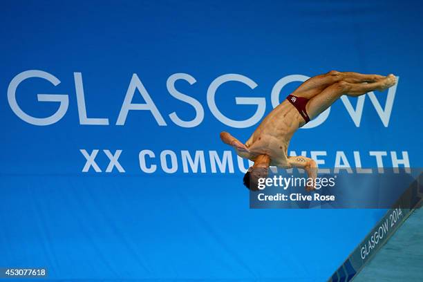 Tom Daley of England attempts the second dive of his six during the Men's 10m Platform Final at the Royal Commonwealth Pool during day ten of the...