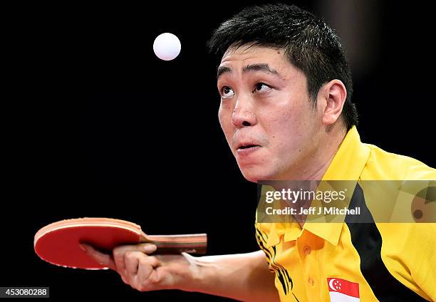 Ning Gao of Singapore competes against Jian Zhan of Singapore in the Men's Singles Gold Medal Match at Scotstoun Sports Campus during day ten of the...