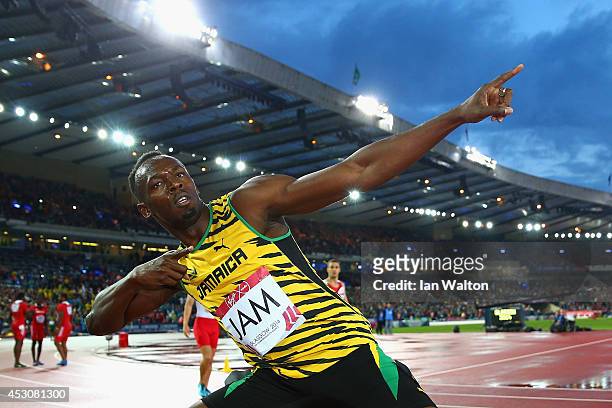 Usain Bolt of Jamaica celebrates winning gold in the Mens 4x100 metres relay final at Hampden Park during day ten of the Glasgow 2014 Commonwealth...
