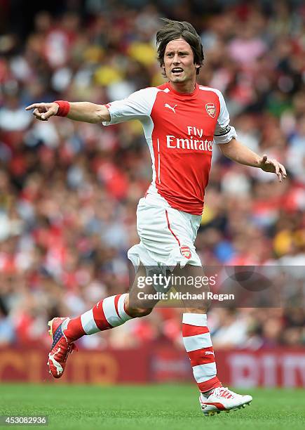 Tomas Rosicky of Arsenal in action during the Emirates Cup match between Arsenal and Benfica at the Emirates Stadium on August 2, 2014 in London,...