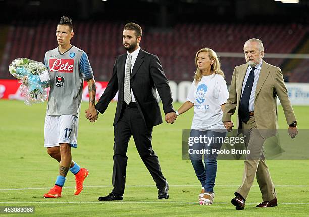 Marek Hamsik, Edoardo De Laurentis, the mother Antonella Leardi and the President Aurelio De Laurentis bring flowers in memory of Ciro Esposito death...