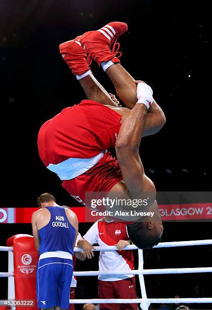 Joseph Joyce of England celebrates winning the gold medal against Joseph Goodall of Australia in the Men's Super Heavy Final at SSE Hydro during day...