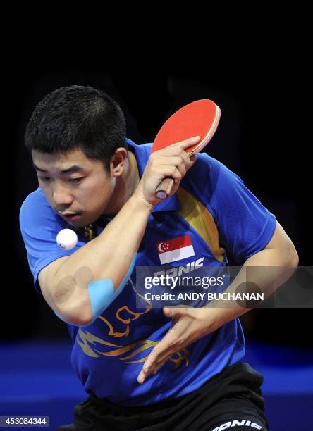 Zhan Jian of Singapore on his way to victory over Gao Ning of Singapore in the gold medal match in the men's singles Table Tennis competition at...