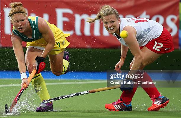 Georgia Nanscawen of Australia hits her shot away from Hollie Webb during the Women's Gold Medal Match between Australia and England at Glasgow...