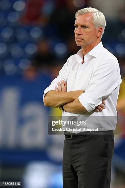 Head coach Alan Pardew of Newcastle United looks on during the match between FC Malaga and Newcastle United as part of the Schalke 04 Cup Day at...