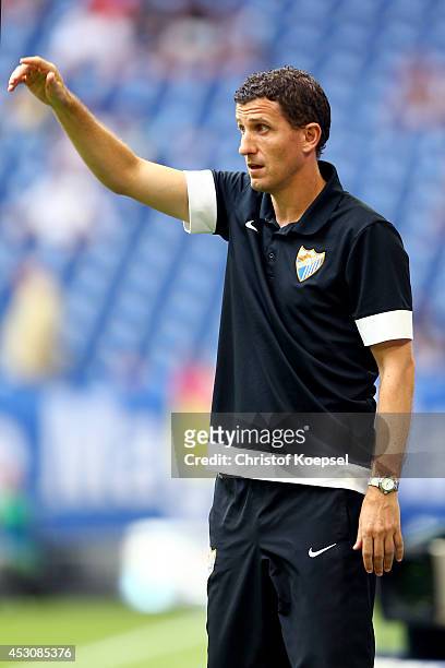 Head coach Javi Gracia of Malaga issues instructions during the match between FC Malaga and Newcastle United as part of the Schalke 04 Cup Day at...