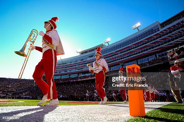 The Nebraska Cornhuskers marching band takes the field beg or their game against the Michigan State Spartans at Memorial Stadium on November 16, 2013...